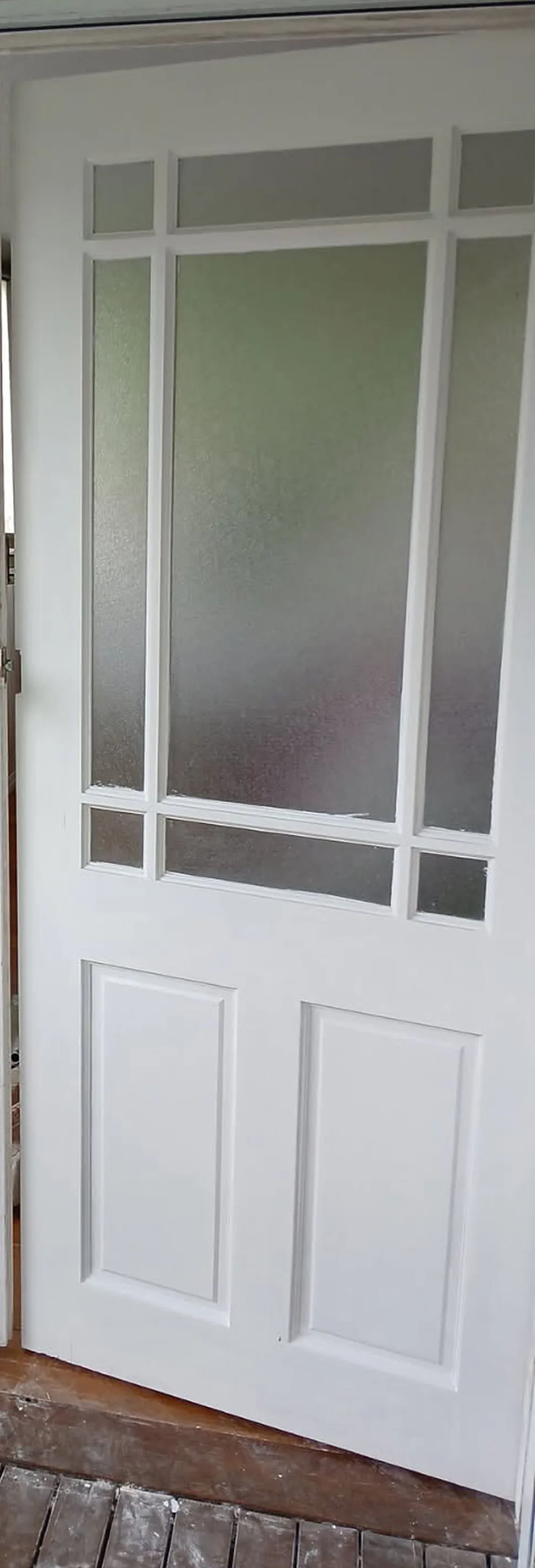 After: the same door freshly painted
